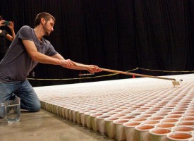 A huge mosaic picture composed of 66,000 paper cups with coloured water